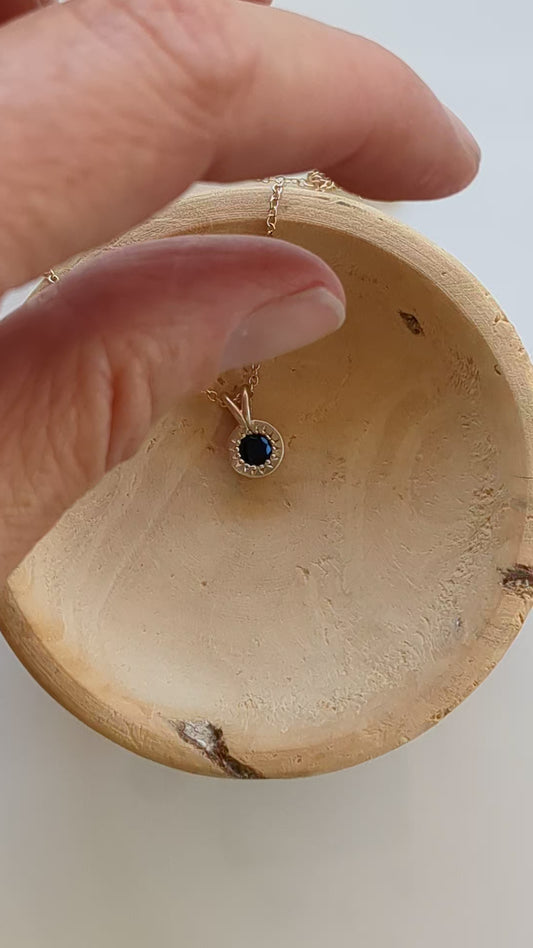 Liquidation — Mini Celestial Pendant — Black Spinel
